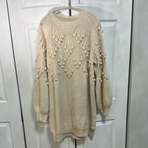 Elegant Cream Sweater with Textured Design